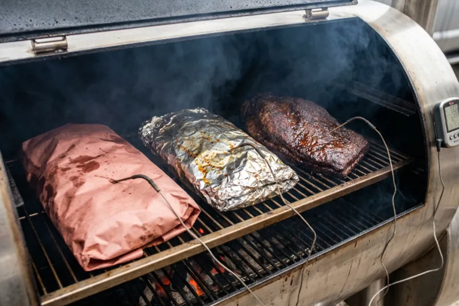 Comparison test of brisket wrapping methods with temperature probes.