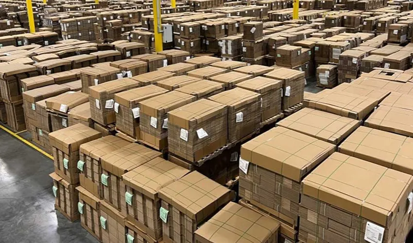 Packers working the fulfillment line, observed during the audit
