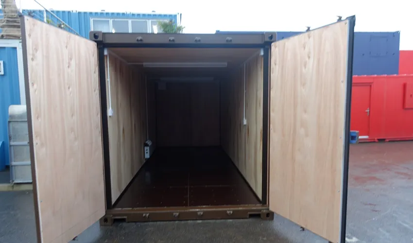 When the ocean temperature drops, that air cools. Condensation beads on the steel walls and drips onto your boxes.