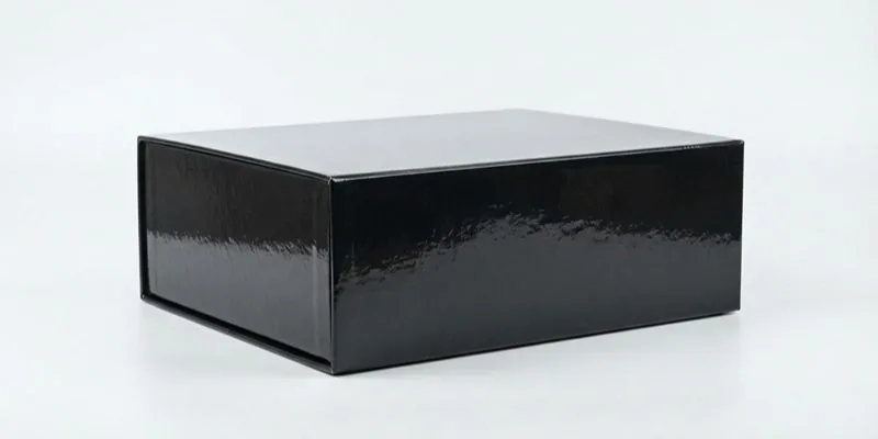 A glossy black rigid box on a plain white background