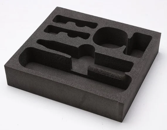 A die-cut EVA cradle holding a row of carts