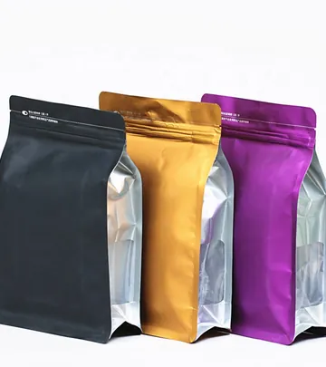 Three metallic pouches in black, gold and violet