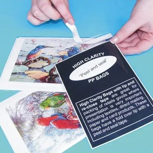 A hand peeling back the resealable tape strip along the lip of a clear bag