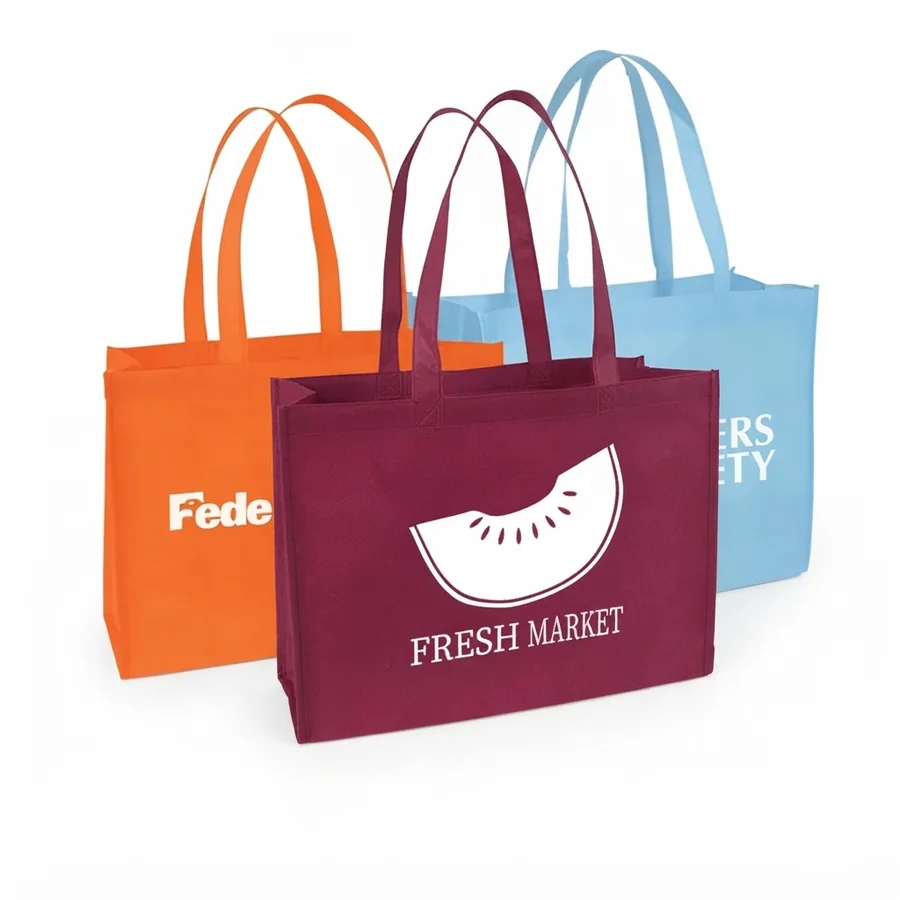 Orange, maroon and light blue nonwoven shopping bags printed with a fruit mark and a logo