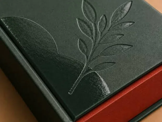 Emboss finish on a rigid box