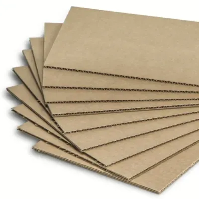 A stack of duplex board sheets with a kraft back and a white face